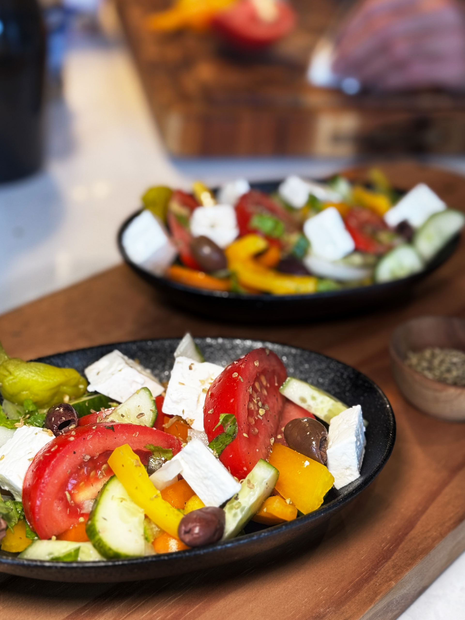 Greek Village Salad on a wood board