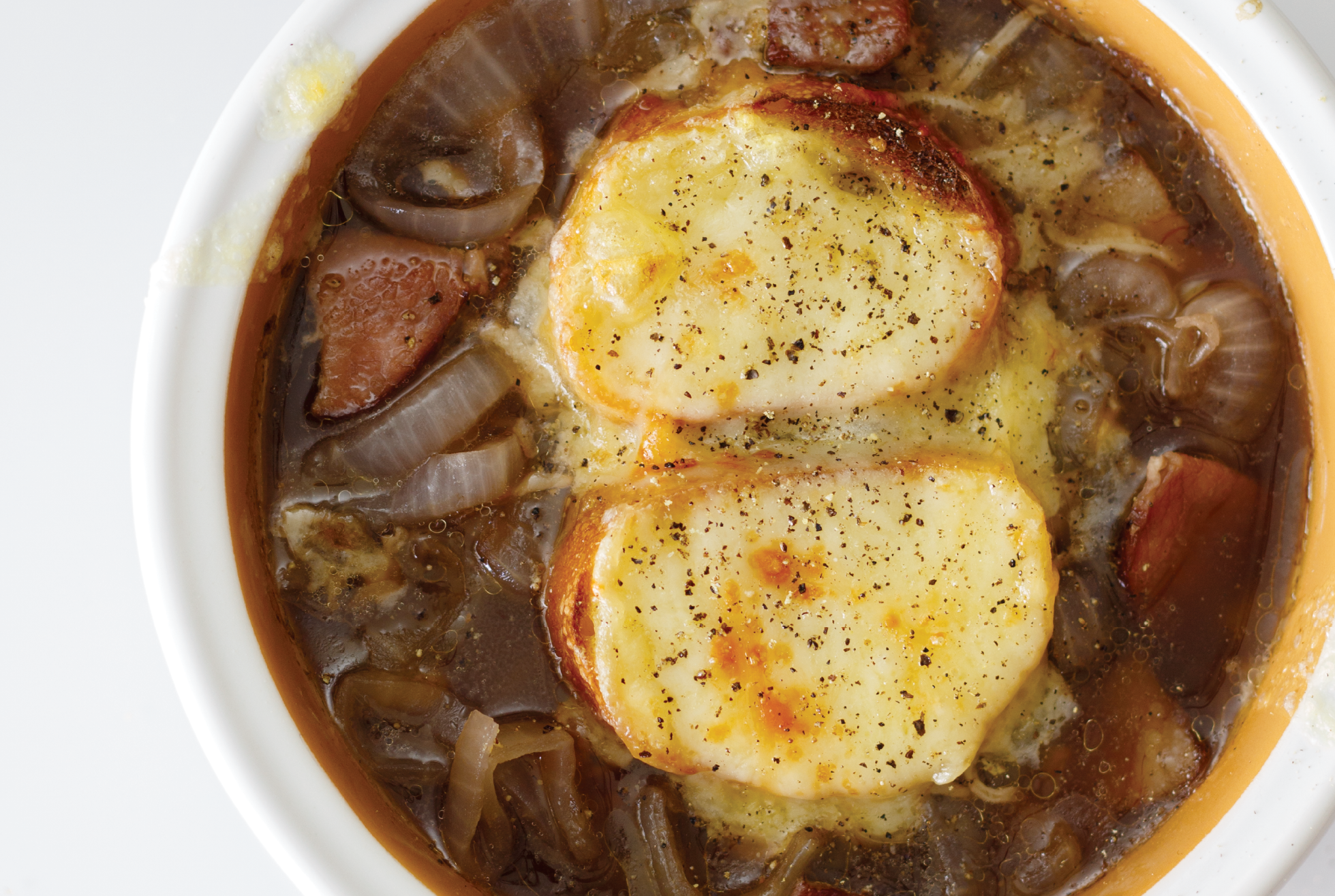Stout Beer French Onion Soup on white. 