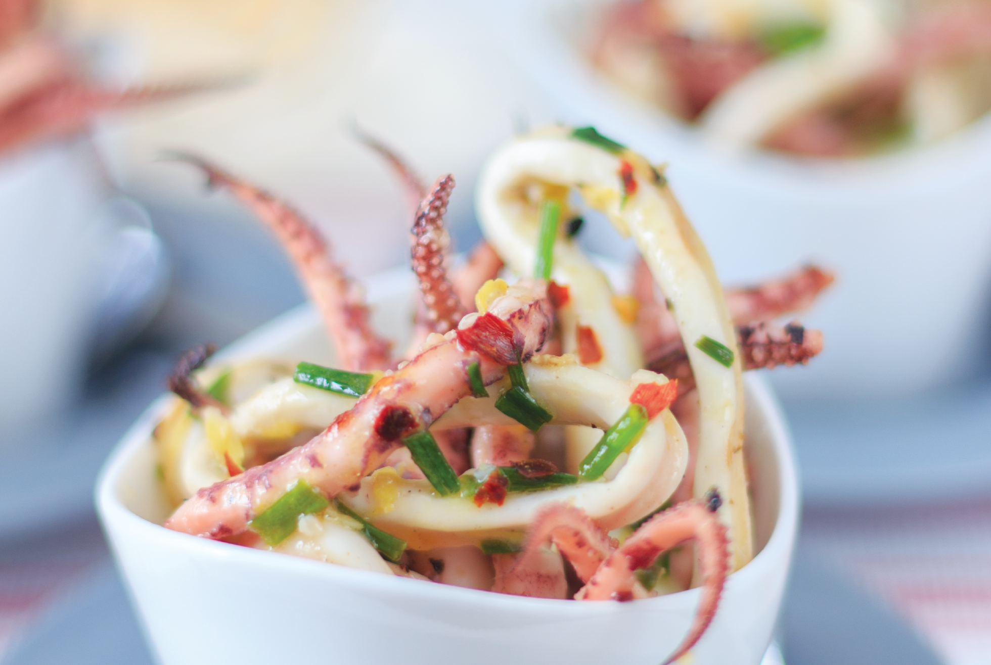 Grilled octopus with Herbes de Provence on bed of bruchetta