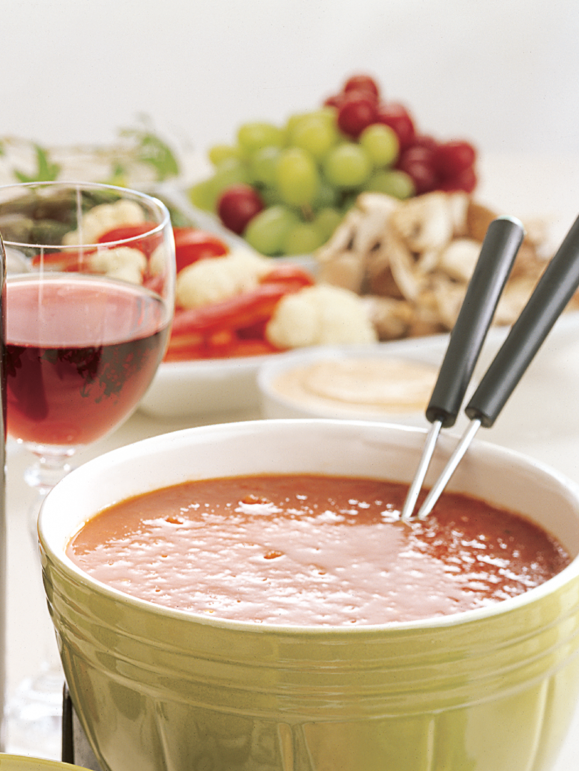 Bistro Chinese Fondue Trio with wine in the background