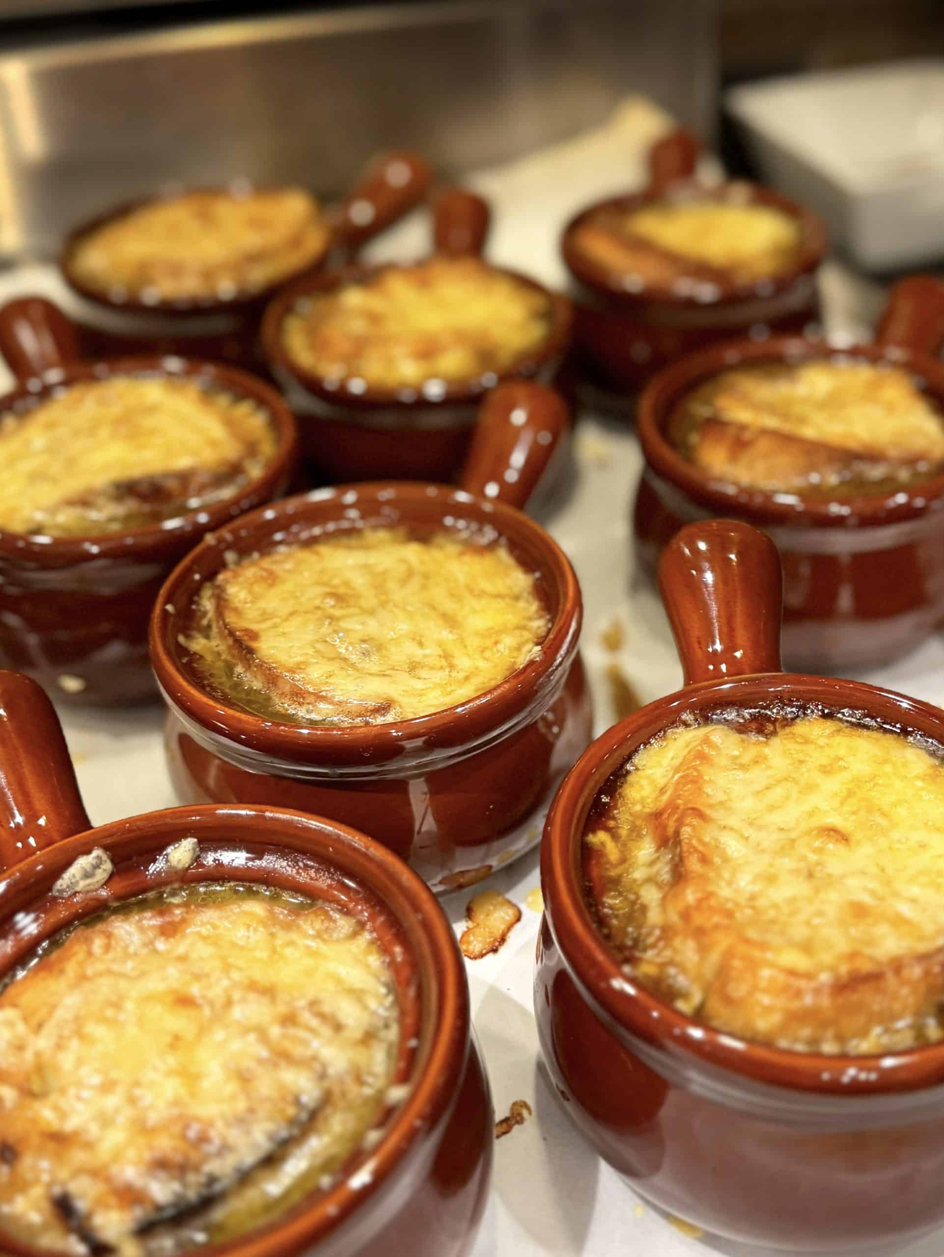 Chef nico cooks french onion soup with cheese